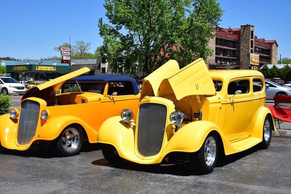 yellow cars in parking lot during Pigeon Forge Rod Run